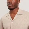 MERRIK Relaxed Geo Stitch Short Sleeve Shirt